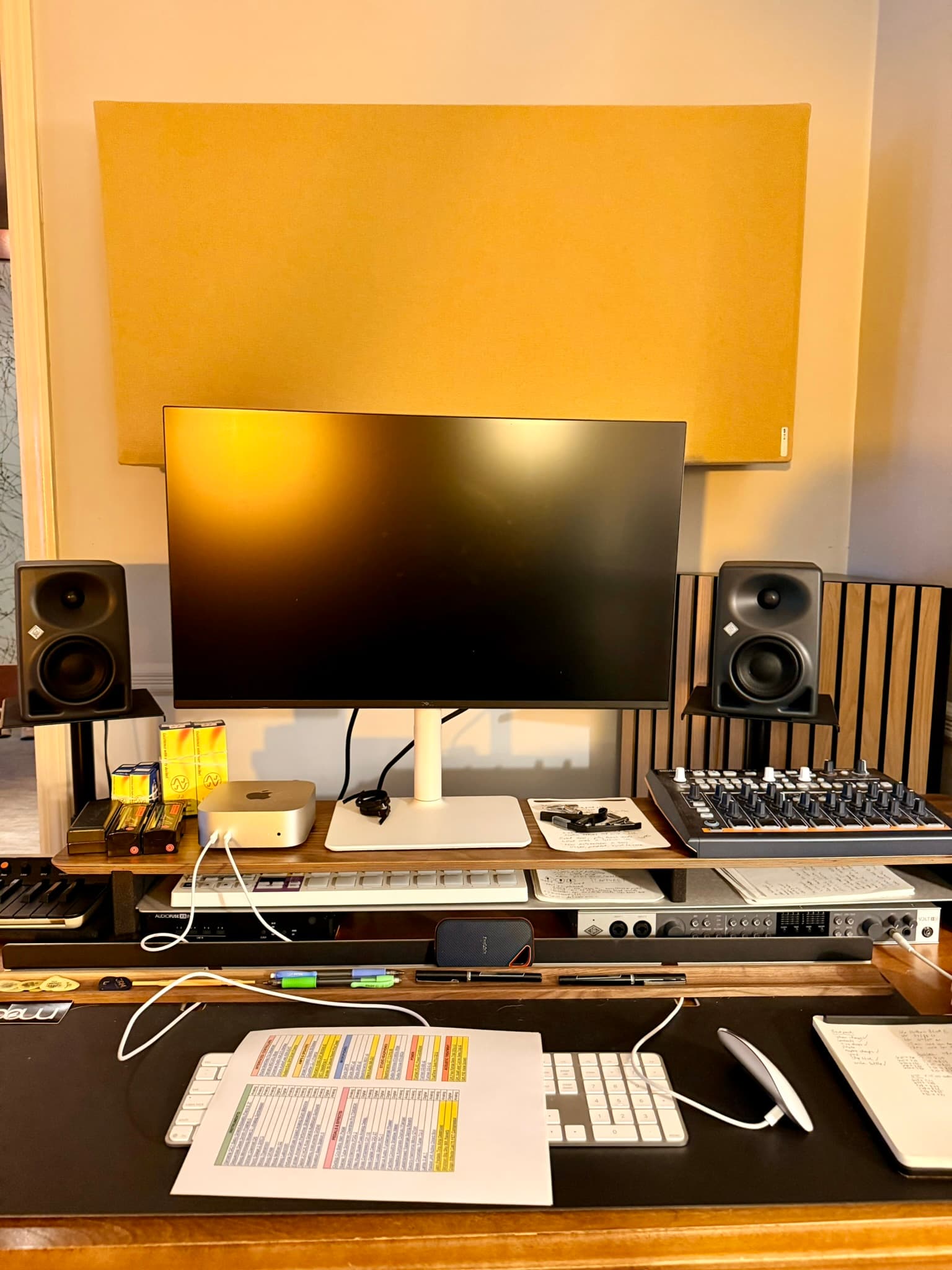 Mixing desk with the monitor, Mac Mini, KH 80 DSP pair, AudioFuse X8IN and Volt 876 on the rack shelf